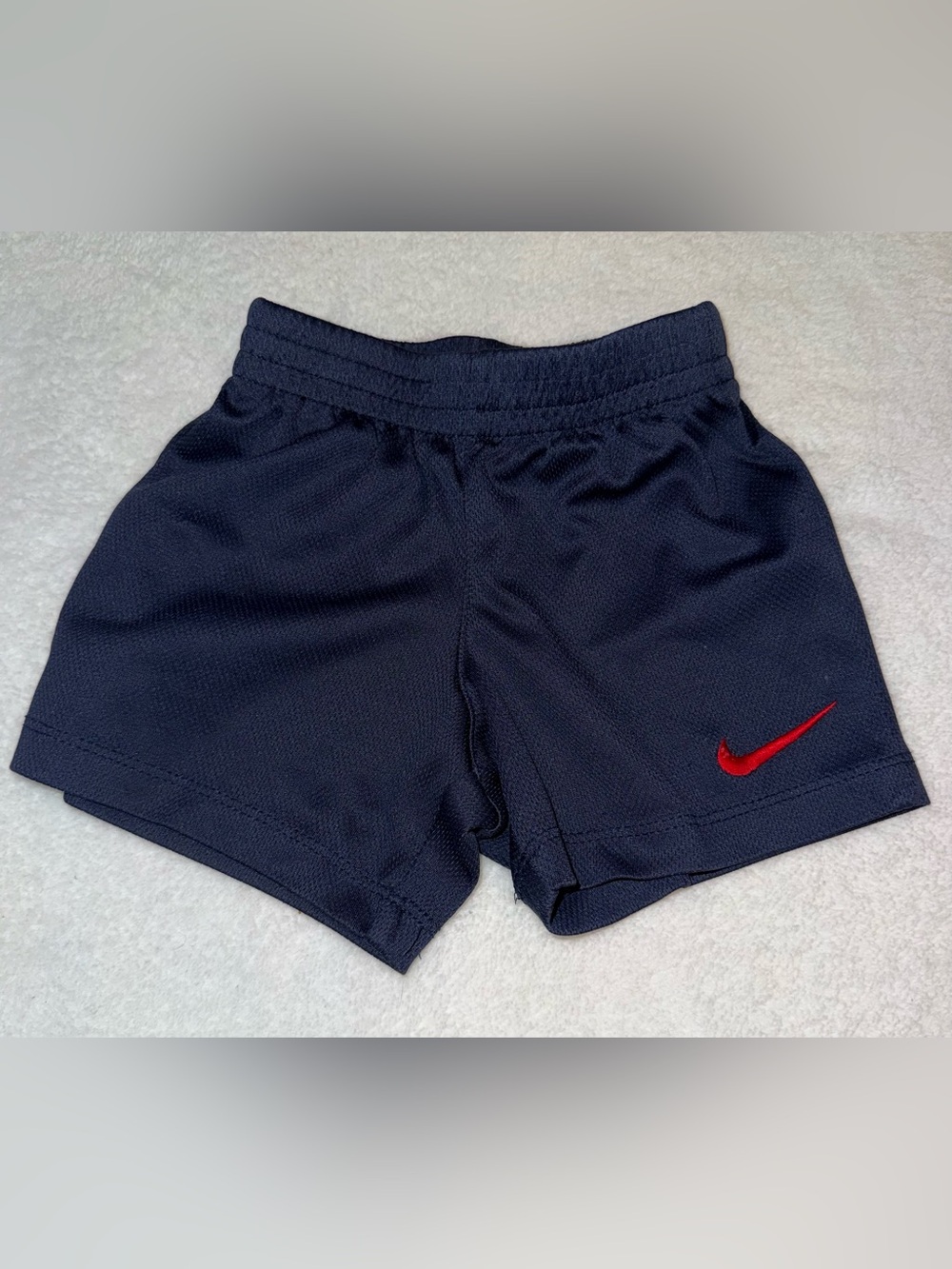 Nike navy blue with red swoosh toddler basketball shorts, size 18 mos
